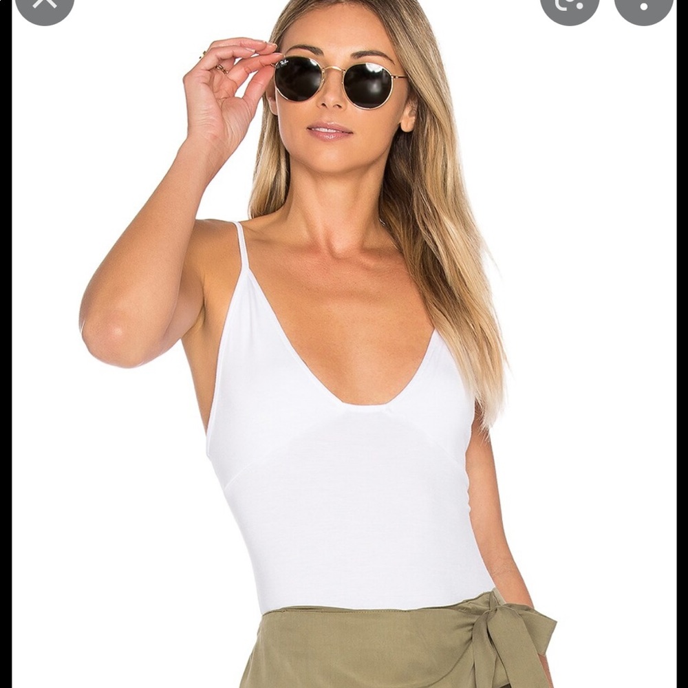 Kiss & Tell Bodysuit in White
Project Social T